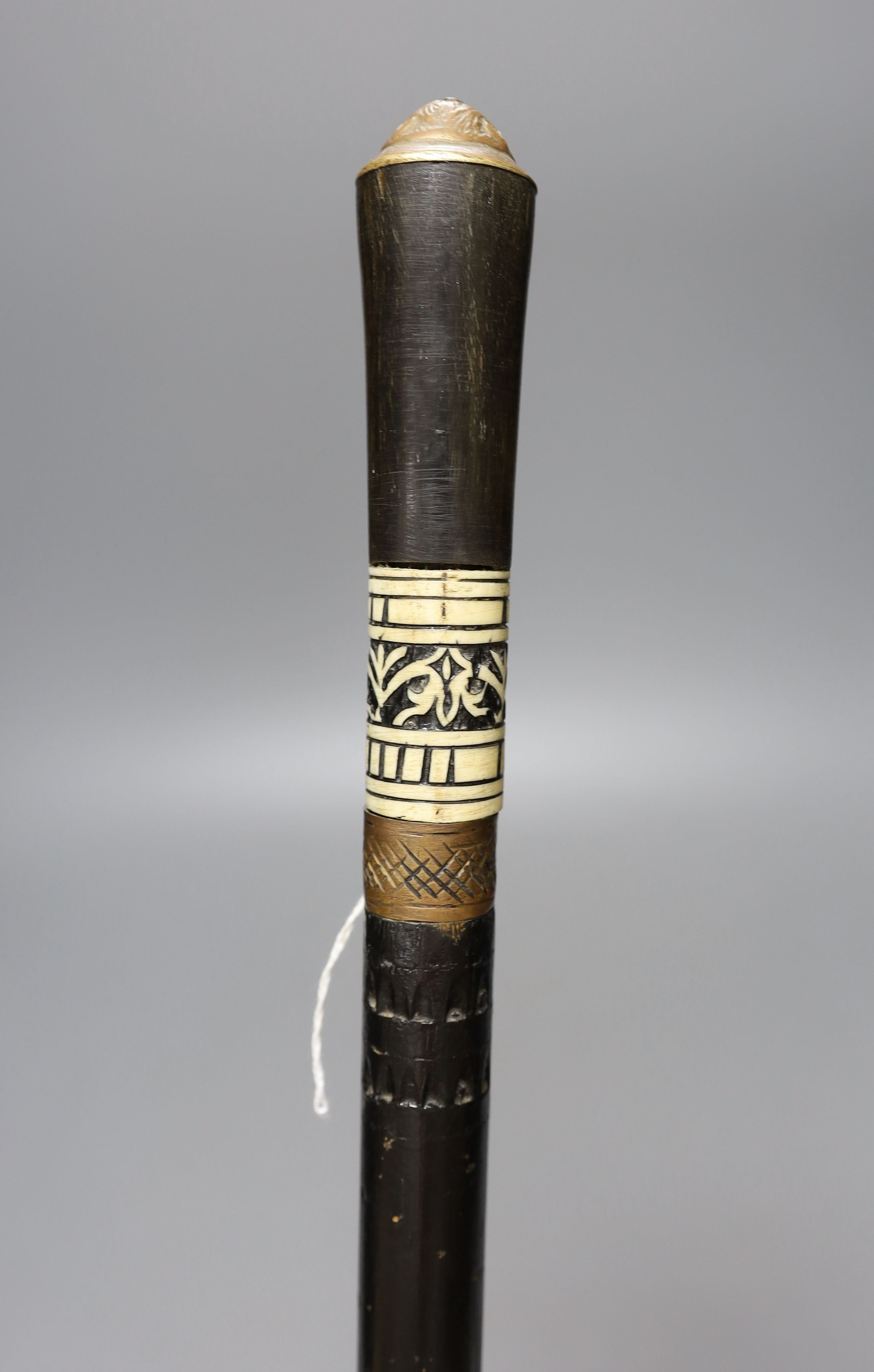 A bone and lacquered wood sword stick - 92cm tall